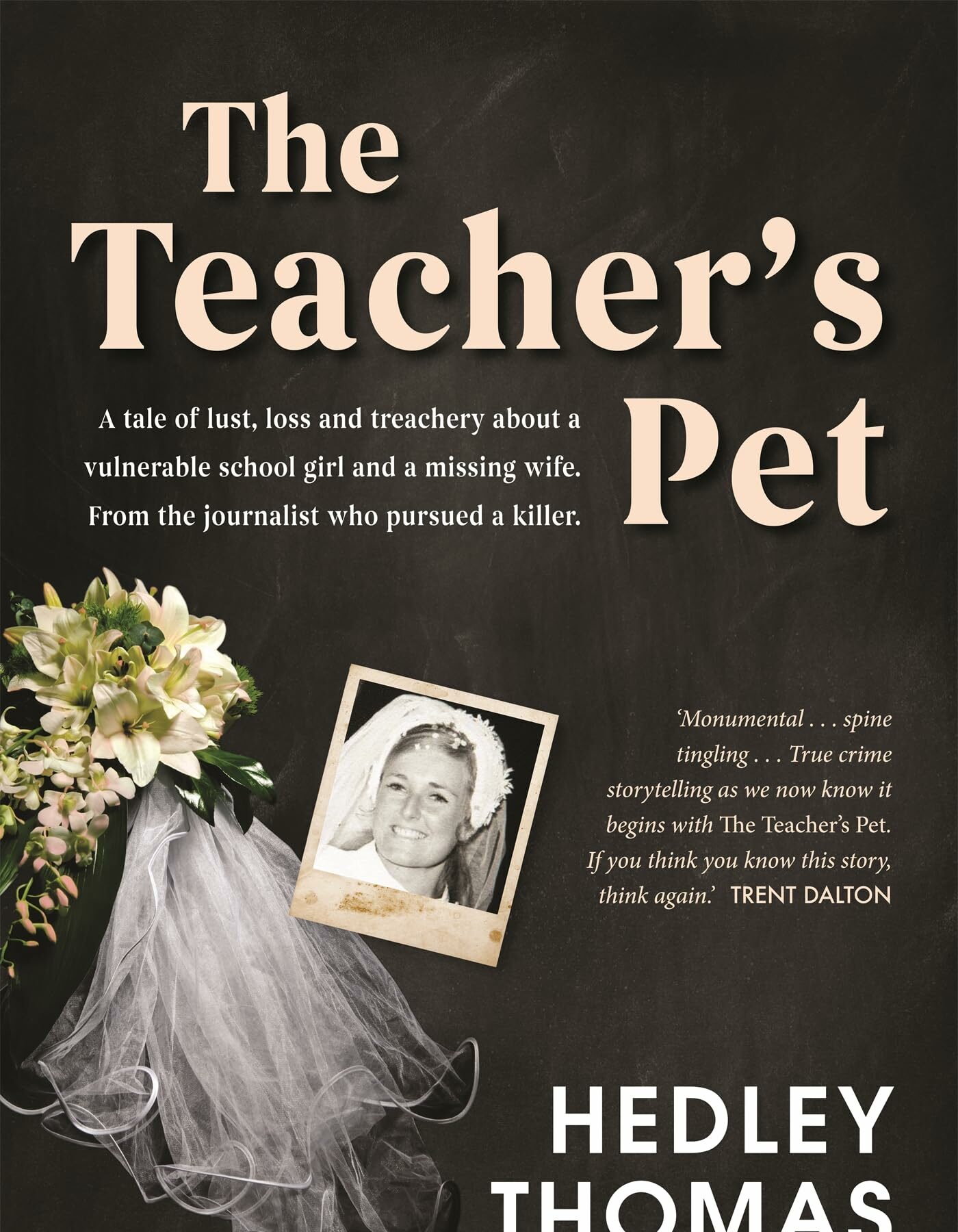 A grey-black book cover with a bouquet, veil and snapshot photograph