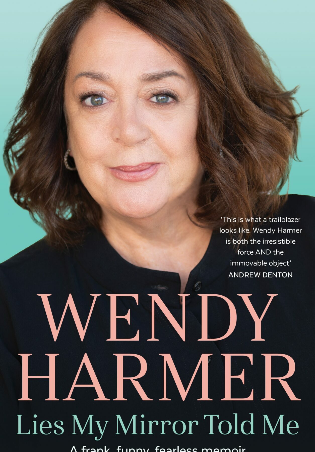 A book cover featuring a photograph of Wendy Harmer in a navy blouse with her name in large pink letters in the bottom half of the page and the title in blue underneath